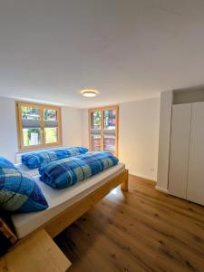 Postel nebo postele na pokoji v ubytování Ferienwohnung Rosenburg + 8 fotografií