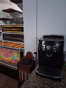 a food processor sitting on a counter next to an oven at Escale fleurie in Toulouse +19 photos