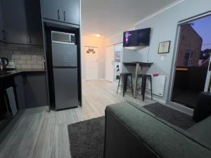 Η κουζίνα ή μικρή κουζίνα στο Marbella - Cozy studio in Heart of Table View