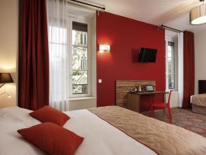Ένα ή περισσότερα κρεβάτια σε δωμάτιο στο Aparthotel Adagio Lyon Patio Confluence +51 φωτογραφίες