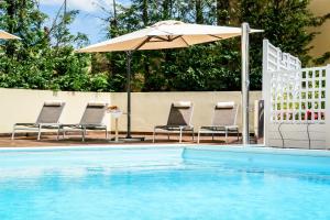Bazén v ubytovaní Hotel Concorde alebo v jeho blízkosti