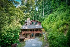 an aerial view of a house in the woods at Little Creek Lodge in Vilas