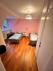Postel nebo postele na pokoji v ubytování FF Accomodation