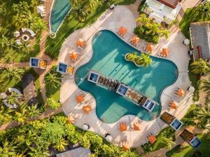 an overhead view of a swimming pool at a resort at Villa Del Palmar Cancun Luxury Beach Resort Spa in Cancún