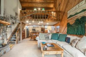a living room with a couch and a table at 3 Bedrooms + Loft townhome in Snowcreek Phase 3, Private Pool Table Sleeps 6 Guests, Dog Friendly in Old Mammoth