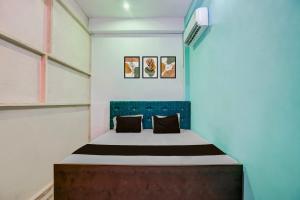 Hotel O Ayush Hotel & Restaurantにあるベッド