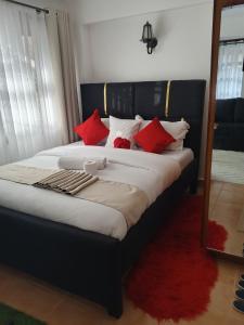 Ένα ή περισσότερα κρεβάτια σε δωμάτιο στο Budget bliss3 bnb Ruaka