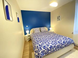 Ένα ή περισσότερα κρεβάτια σε δωμάτιο στο L'Escapade - parenthèse cosy à Hauteville