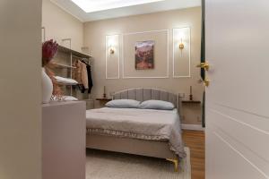 Postel nebo postele na pokoji v ubytování Clair de Lune