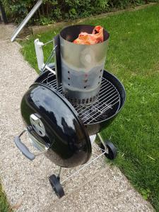 a grill with a pot on top of it at Ferienhaus Christian in Sankt Andrä bei Frauenkirchen