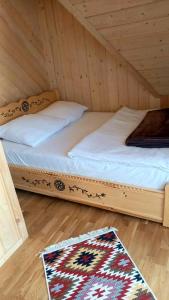 Ένα ή περισσότερα κρεβάτια σε δωμάτιο στο Bachledowy Wierch 2 +27 φωτογραφίες