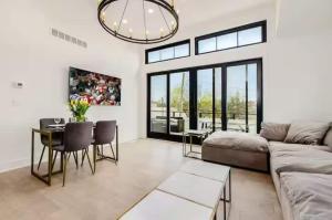 a living room with a couch and a table at Short North Convention Garage Parking! in Columbus