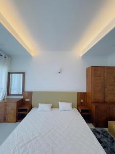 Postel nebo postele na pokoji v ubytování Threesaru resort