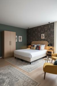 Ένα ή περισσότερα κρεβάτια σε δωμάτιο στο L21 Hotel Erfurt