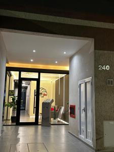 a lobby with a room with a machine in it at Caleta View Marítimo in Puerto Madryn