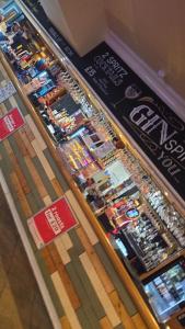 a display case in a store filled with lots of goods at A&l by the sea in Fleetwood +1 photo