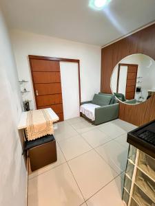 Et opholdsområde på Copacabana Excellent Home