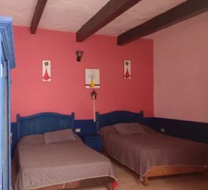 Postel nebo postele na pokoji v ubytování Hotel Los Remedios LUUM + 2 fotografie