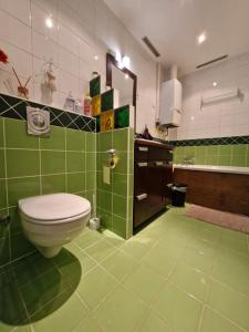 Koupelna v ubytování Deák Apartman + 48 fotografií