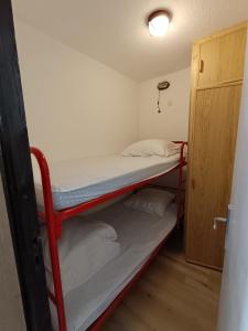 Postel nebo postele na pokoji v ubytování Les Tètras