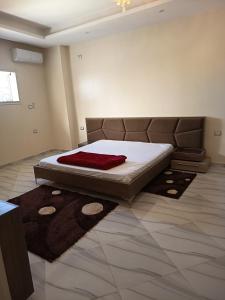 Un pat sau paturi într-o cameră la Mariem