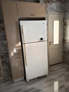 O bucătărie sau chicinetă la Mariem