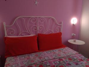 Postel nebo postele na pokoji v ubytování Experience Cilento Rooms"