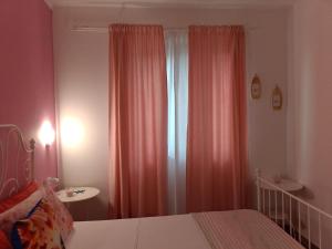 Postel nebo postele na pokoji v ubytování Experience Cilento Rooms"