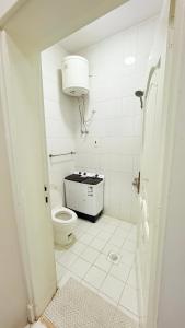 a bathroom with a toilet and a sink at مثوى in Al Madinah
