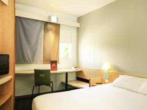 Ένα ή περισσότερα κρεβάτια σε δωμάτιο στο ibis Orange Centre +121 φωτογραφίες