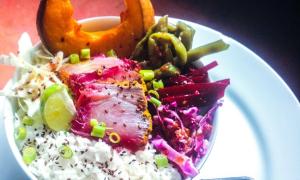 a plate of food with rice and meat and vegetables at Surf Dine in Matara