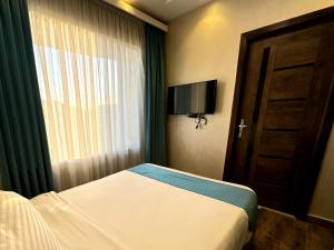 TV a/nebo společenská místnost v ubytování Beko 3 pyramids