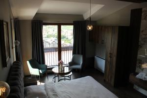 Ένα ή περισσότερα κρεβάτια σε δωμάτιο στο Obrov Apartments