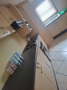 an overhead view of a kitchen with a refrigerator at Sea Breeze Valley 2 in East London