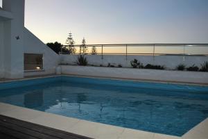Swimmingpoolen hos eller tæt på Apartamentos Mar de Alvor
