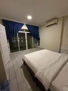 Postel nebo postele na pokoji v ubytování Meraki Resorts 15-2