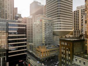 an aerial view of a city with tall buildings at ibis Sydney World Square in Sydney