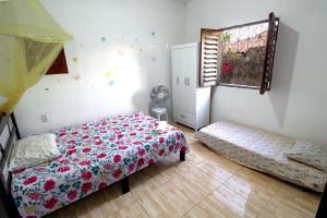 Postel nebo postele na pokoji v ubytování Casa Caminho das Dunas - Refúgio entre as Dunas e o Mar