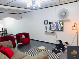 Μια τηλεόραση ή/και κέντρο ψυχαγωγίας στο Hébergement Petit rivière