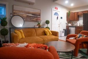 a living room with a couch and a table at Centrally-Located Studio in DWTN Richmond in Richmond +9 photos