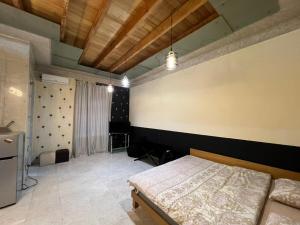 a bedroom with a bed in a room at Balcony Modern Apartment Near Opera and Cascade, Middle of City Center in Yerevan