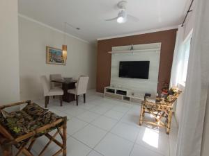 Et tv og/eller underholdning på Casa aconchegante no Centro de Peruíbe, faça tudo a pé