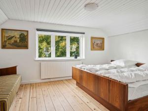 Postel nebo postele na pokoji v ubytování 5 star holiday home in Haderslev