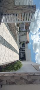 a building with a staircase on the side of it at Ksl refúgio dos pássaros in Araquari +10 photos