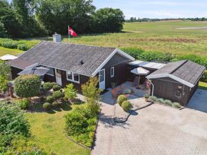 an aerial view of a house with a flag at 5 star holiday home in Karrebæksminde in Karrebæksminde