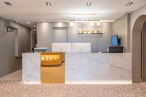 Ο χώρος του λόμπι ή της ρεσεψιόν στο Brown Dot Hotel Gimhae City Hall Branch +32 φωτογραφίες