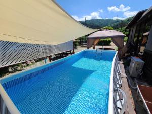 Πισίνα στο ή κοντά στο Gapyeong Private Pension Kkullim House +33 φωτογραφίες