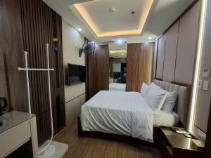 Postel nebo postele na pokoji v ubytování Lavie Hotel + 36 fotografií