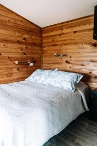 Ένα ή περισσότερα κρεβάτια σε δωμάτιο στο Tiny House Ranco Lauken