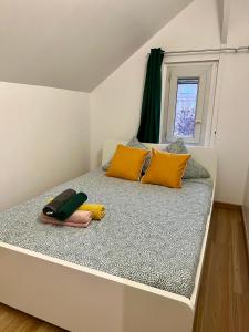 Ένα ή περισσότερα κρεβάτια σε δωμάτιο στο Gagny Chemin de fer charmant hébergement